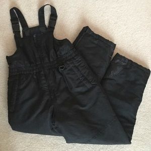 Black overall snow pants